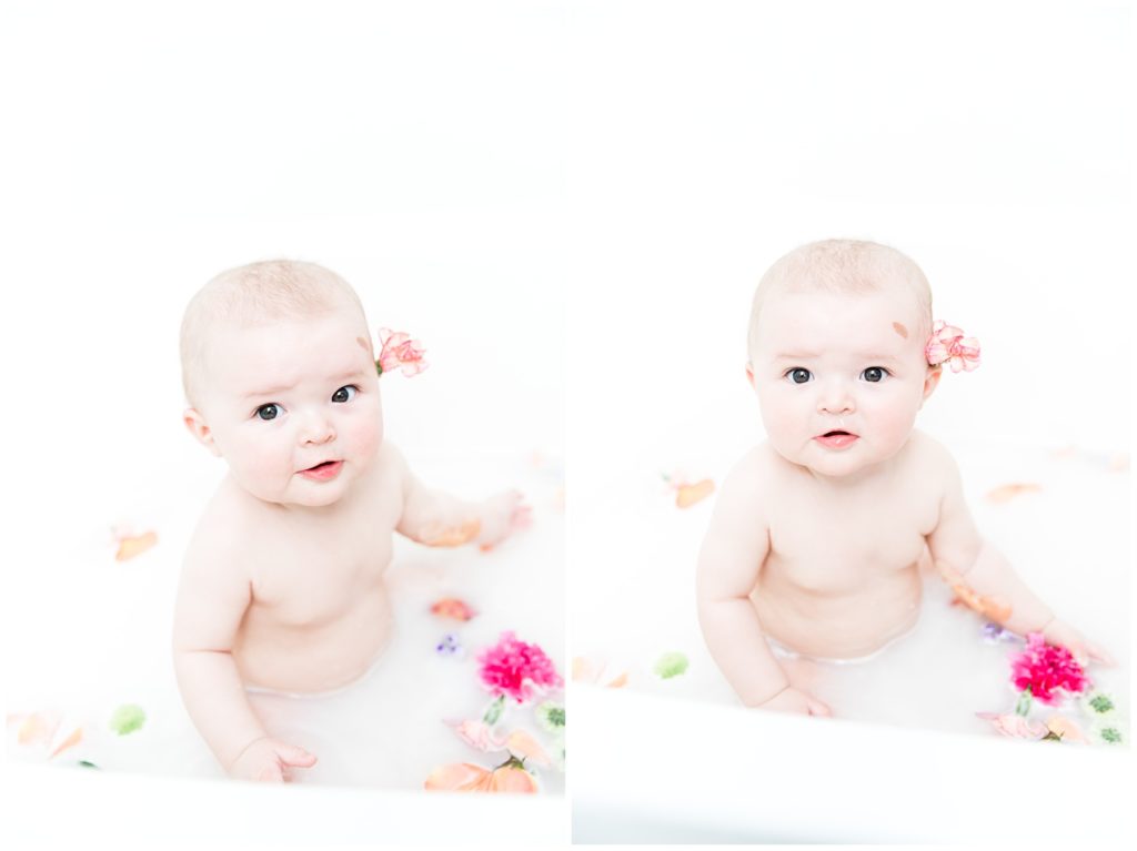 Baby girl in milk bath during six month session