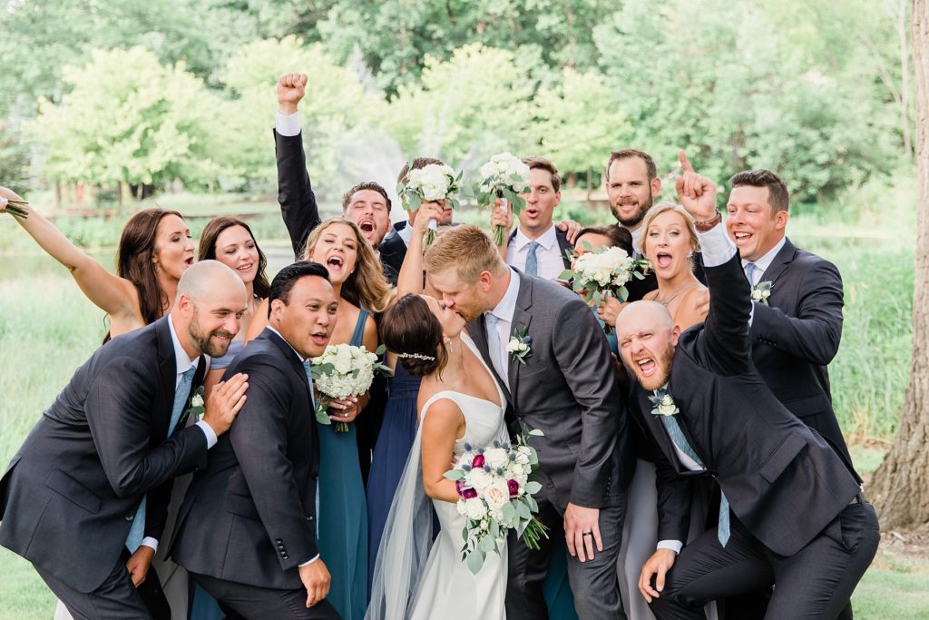 Wedding Party cheers at Abbey Springs