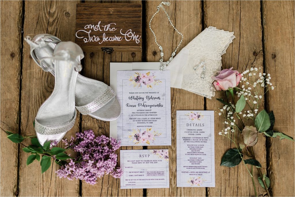 Waukesha wedding details, including the bridal accessories and lavender invitation suite